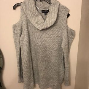 Gray shoulder opening turtle neck sweater.